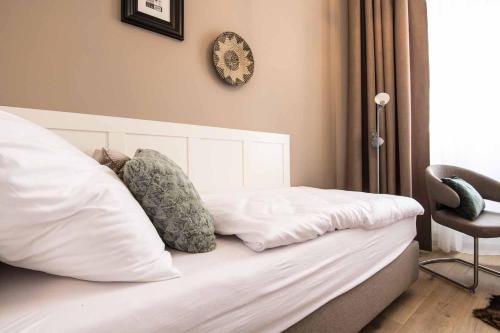 Postel nebo postele na pokoji v ubytování Best Place and Comfort Apartments