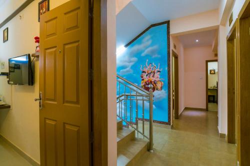 Телевизор и/или развлекательный центр в Blue Bell Cochin Airport Hotel