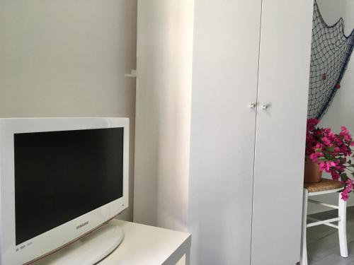 TV a/nebo společenská místnost v ubytování La Casa del mare