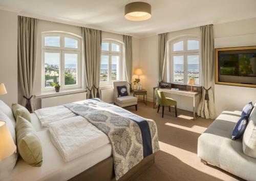 Postel nebo postele na pokoji v ubytování Hotel Am Leuchtturm
