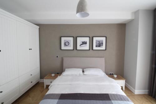 Postel nebo postele na pokoji v ubytování Elia Apartments