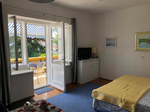 Posteľ alebo postele v izbe v ubytovaní Apartment Lela