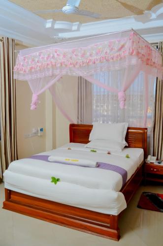 Ένα ή περισσότερα κρεβάτια σε δωμάτιο στο Silver Paradise Hotel