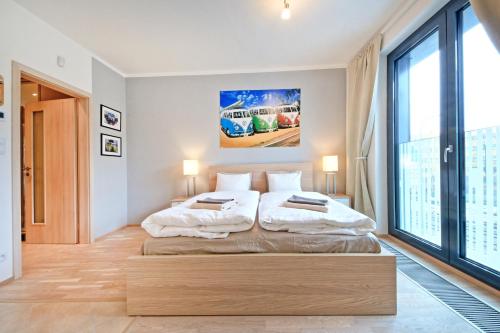 Postel nebo postele na pokoji v ubytování OL apartments
