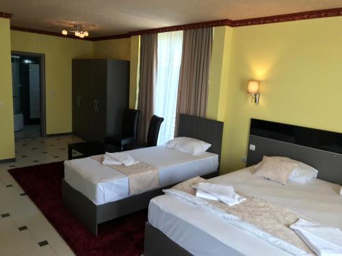 Katil atau katil-katil dalam bilik di Hotel Leon