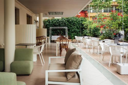 Restorāns vai citas vietas, kur ieturēt maltīti, naktsmītnē Hotel Montecarlo