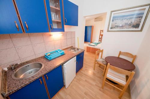 Kuchyň nebo kuchyňský kout v ubytování Guesthouse Šime