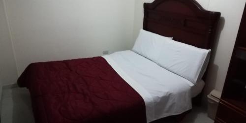 Postel nebo postele na pokoji v ubytování Hostal Fontanar Prado