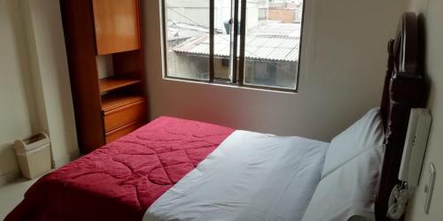 Voodi või voodid majutusasutuse Hostal Fontanar Prado toas