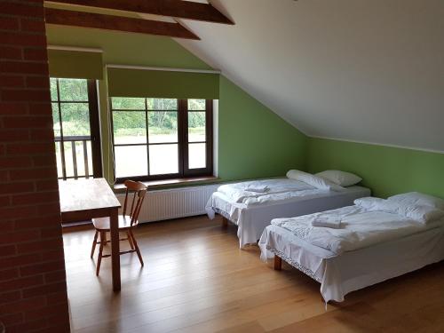 Postel nebo postele na pokoji v ubytování Soomaa Canoe Trips Centre
