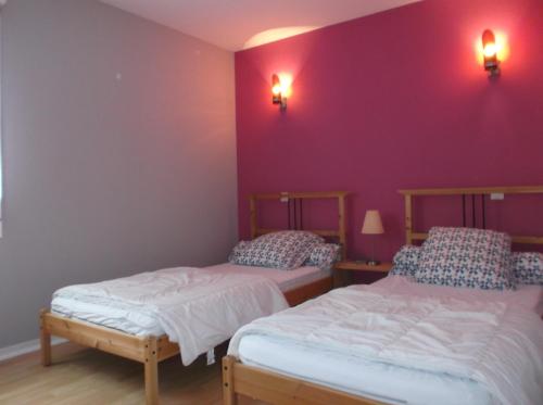 Un pat sau paturi într-o cameră la villa Cotriade