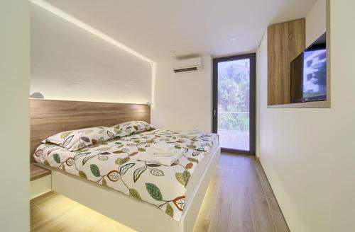 Posteľ alebo postele v izbe v ubytovaní Villa Celeia