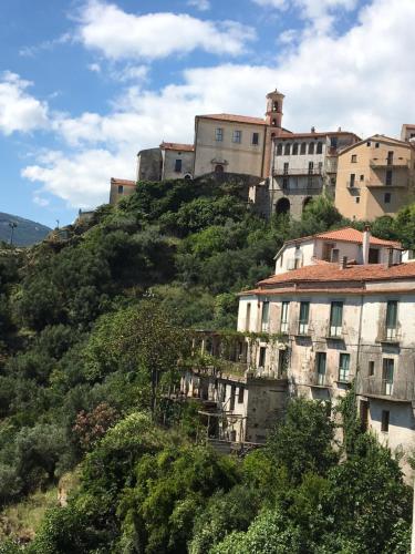 a group of buildings on top of a hill at B&B Lo Straniero in Rivello