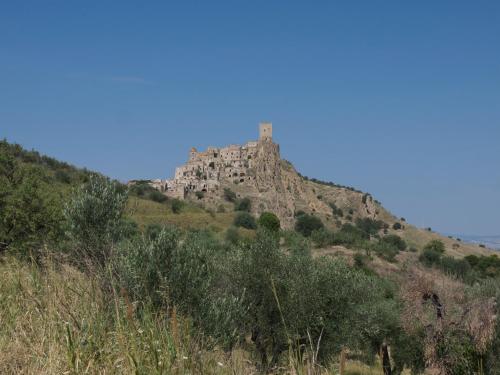 a castle on top of a mountain on a hill at B&B Lo Straniero in Rivello