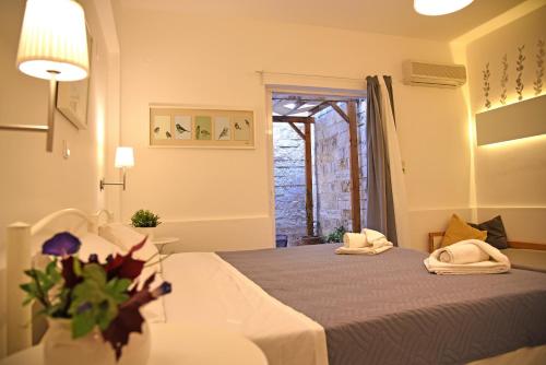 Letto o letti in una camera di Castello Apartments