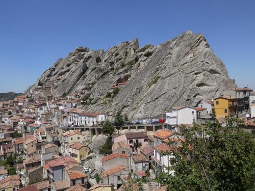a town on a hill with a mountain at B&B Lo Straniero in Rivello