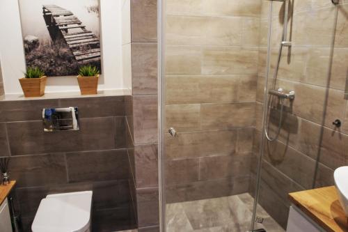 Ένα μπάνιο στο Mono Ray Apartments