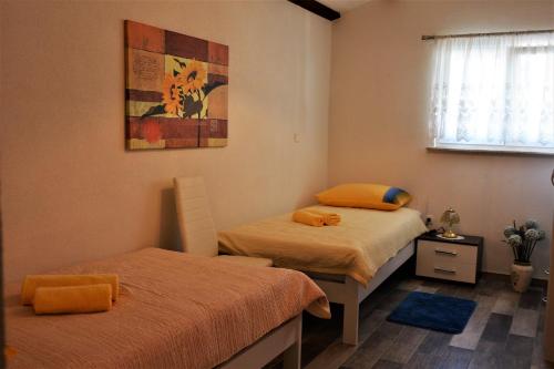 Postel nebo postele na pokoji v ubytování Holiday Home Magdalena