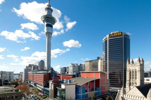 a view of the cn tower in a city at Quest on Hobson Serviced Apartments in Auckland