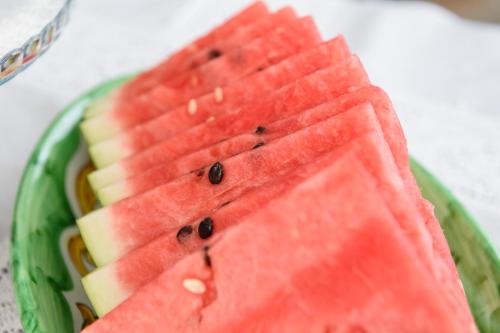 a plate with a bunch of watermelon slices on it at Maelka Belvedere in Agropoli