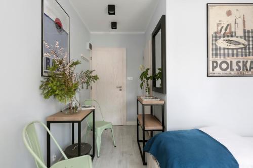 Postel nebo postele na pokoji v ubytování Pokoje i Apartamenty Poddąbie 2