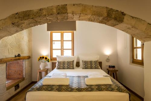 Ένα ή περισσότερα κρεβάτια σε δωμάτιο στο Aelios Design Hotel