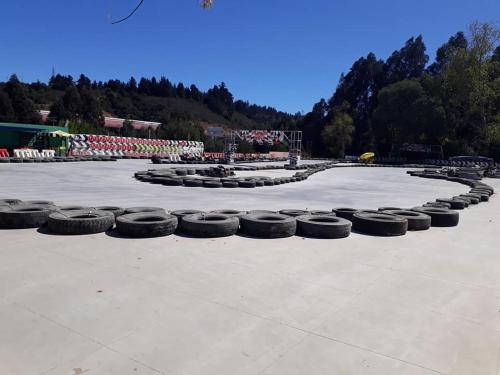 a group of tires are lined up in a parking lot at Departamento Viña del Mar in Viña del Mar