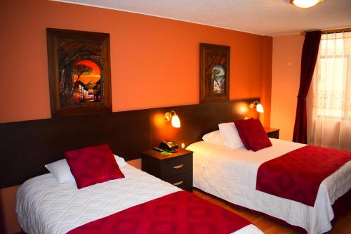 Postel nebo postele na pokoji v ubytování Endamo Hotel