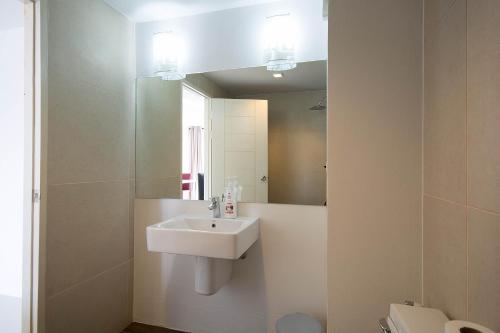 a bathroom with a sink and a mirror at Mosaic Condominium A34M by malai in Ban Bua Phut