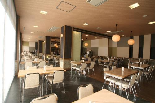 ห้องอาหารหรือที่รับประทานอาหารของ Tominoko Hotel