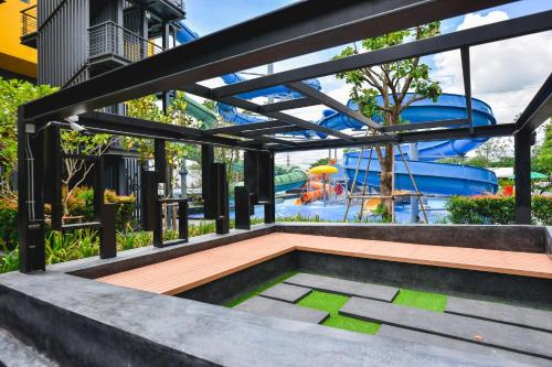 a view of a water park with a water slide at 9D Sport Hotel in Udon Thani