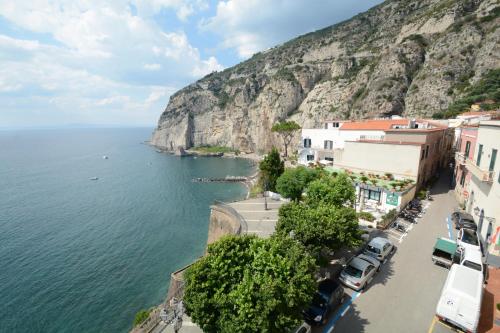 an aerial view of a town next to the water at Panorama Palace Hotel in Meta