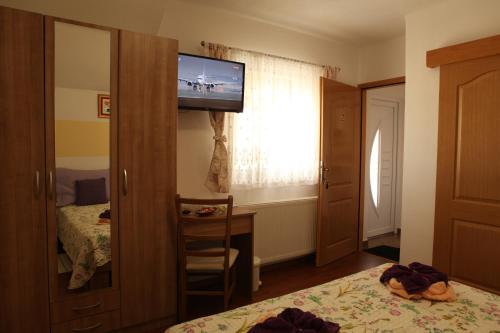 Ένα ή περισσότερα κρεβάτια σε δωμάτιο στο Guesthouse Samolov