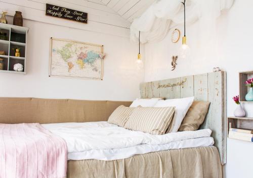 Una cama o camas en una habitación de Lidö Värdshus