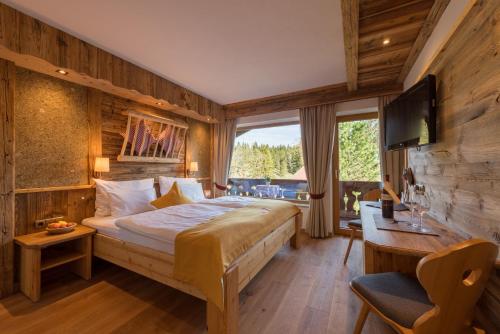 Postel nebo postele na pokoji v ubytování Gröbl-Alm