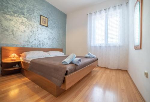 מיטה או מיטות בחדר ב-Guesthouse Jasna
