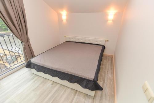 Postel nebo postele na pokoji v ubytování Gerves Apartamentai