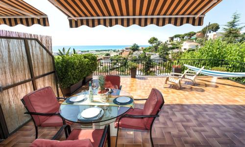 מסעדה או מקום אחר לאכול בו ב-Costa Maresme Apartment