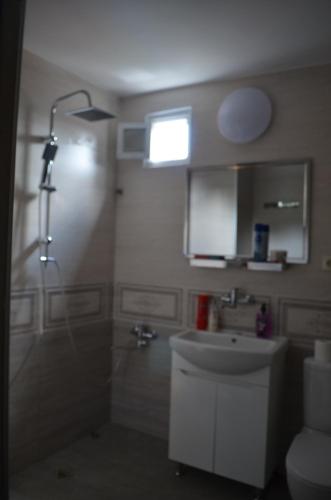 Ванная комната в Sweet Home Agmashenebeli