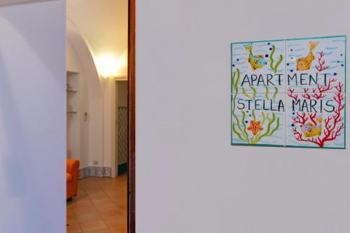a sign on the door of a room at Apartment Stella Maris in Capri