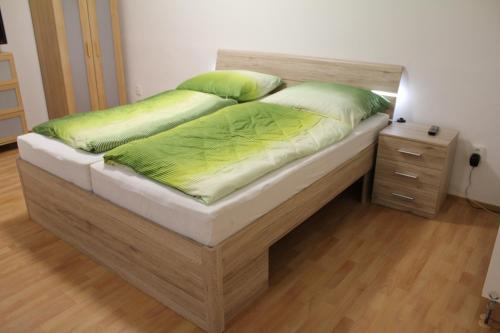 Postel nebo postele na pokoji v ubytování Apartmán 2
