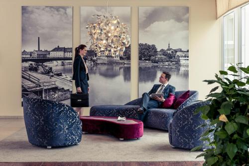 Mercure Hotel Schweinfurt Maininselにあるシーティングエリア