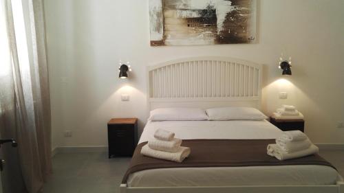 Ліжко або ліжка в номері Cardìlle Apartment