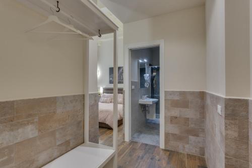 Vonios kambarys apgyvendinimo įstaigoje Navona Charme Suite