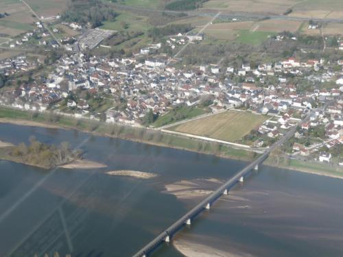 an aerial view of a bridge over a body of water at En bord de Loire in Pouilly-sur-Loire