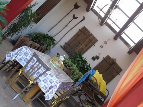 an overhead view of a patio with a table and plants at Cascina Lavaroni in Buttrio
