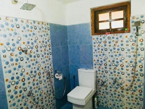 Ένα μπάνιο στο Kawshan Home Stay