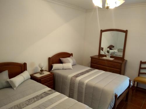 Llit o llits en una habitació de Joaquim do Norte
