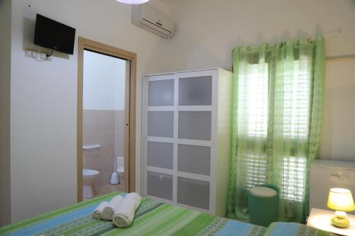 Cama o camas de una habitación en Meraviglie del Salento