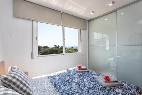Posteľ alebo postele v izbe v ubytovaní Costa Maresme Apartment